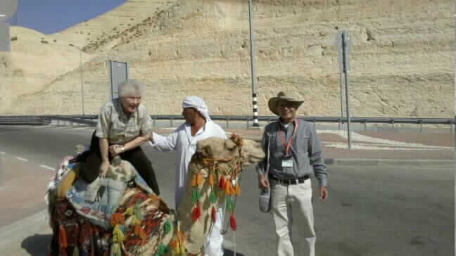 Riding a camel near the Dead Sea